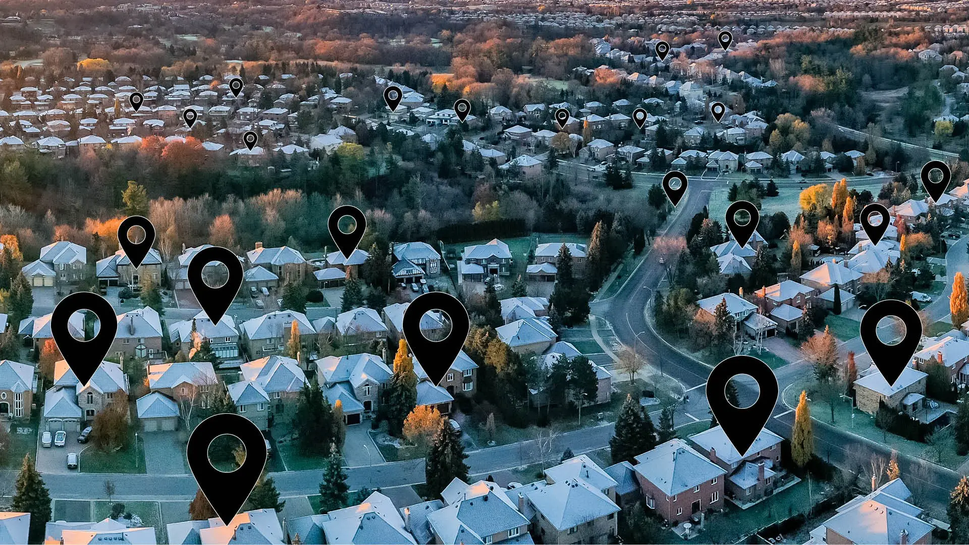 Aerial view of houses with map locations on dozens of addresses