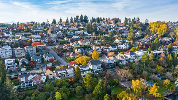 How to Find the Right Target Audience Webinar - drone view of houses in a neighborhood with lots of trees on a nice day