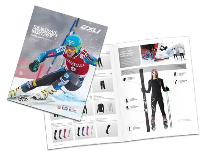 Catalog Booklet - Showing the cover and an open booklet. Feauting people skiing and ski equipment.