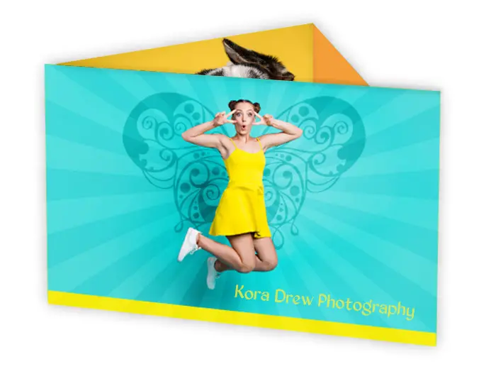 Panoramic Triple Deluxe Folded Card Printing - Product Image with bright colors and a woman in a yellow dress jumping